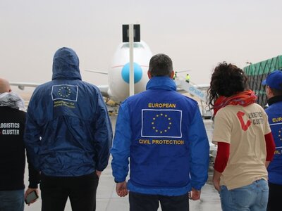 Photo: WFP/Photolibrary Group of people in an air strip.