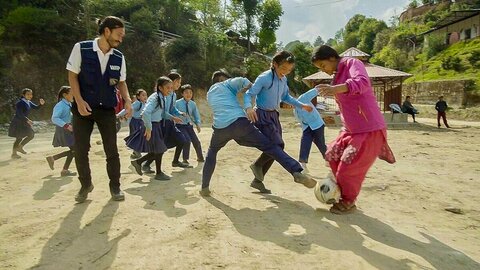 Girls play football in Nepal