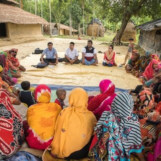 A group listening to some leaders. Photo: WFP/Saikat Mojumder